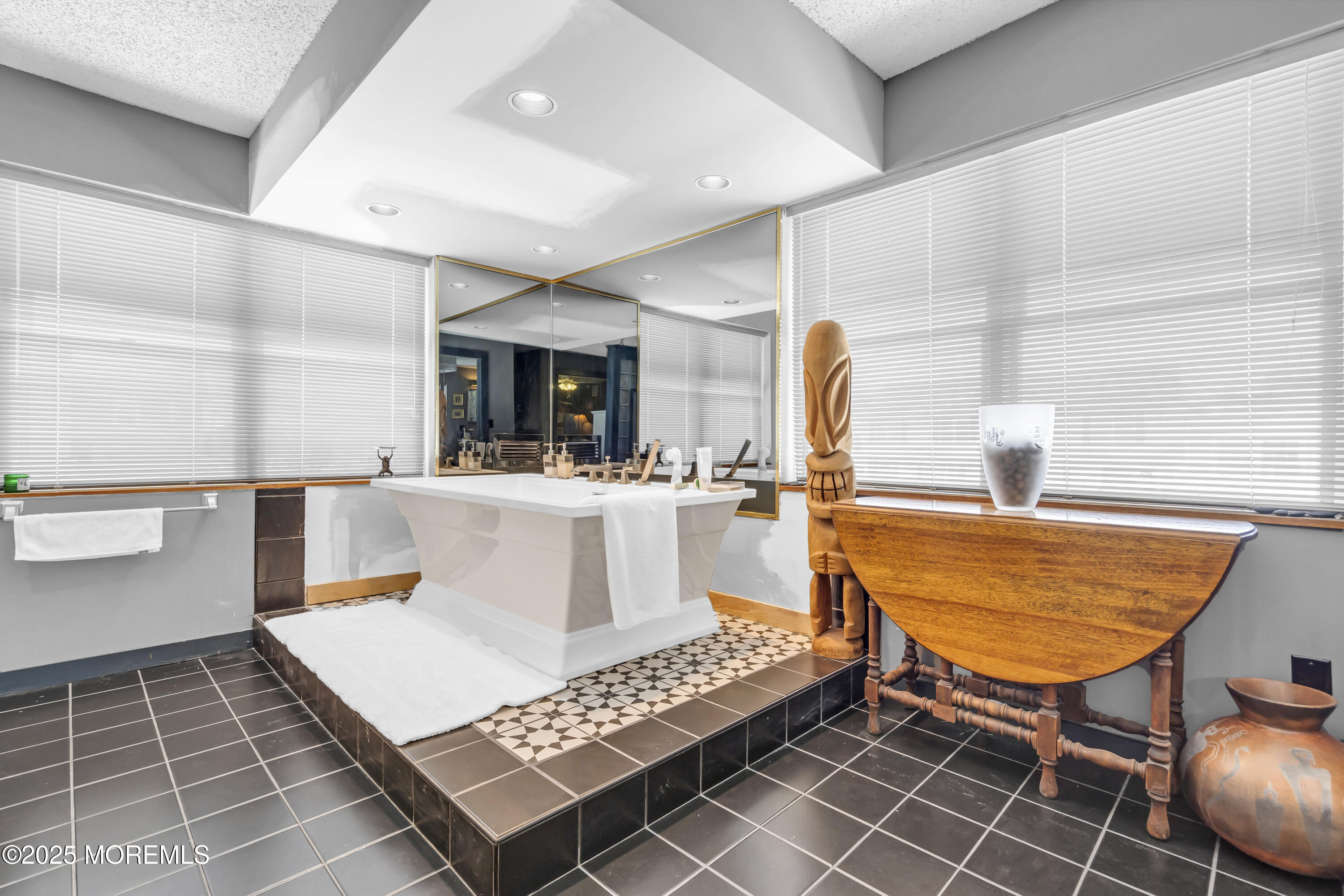 Boulevard, Unit 18 Seaside Park, NJ 08752 - Photo 14 of 60 a living room with furniture a rug and a fireplace