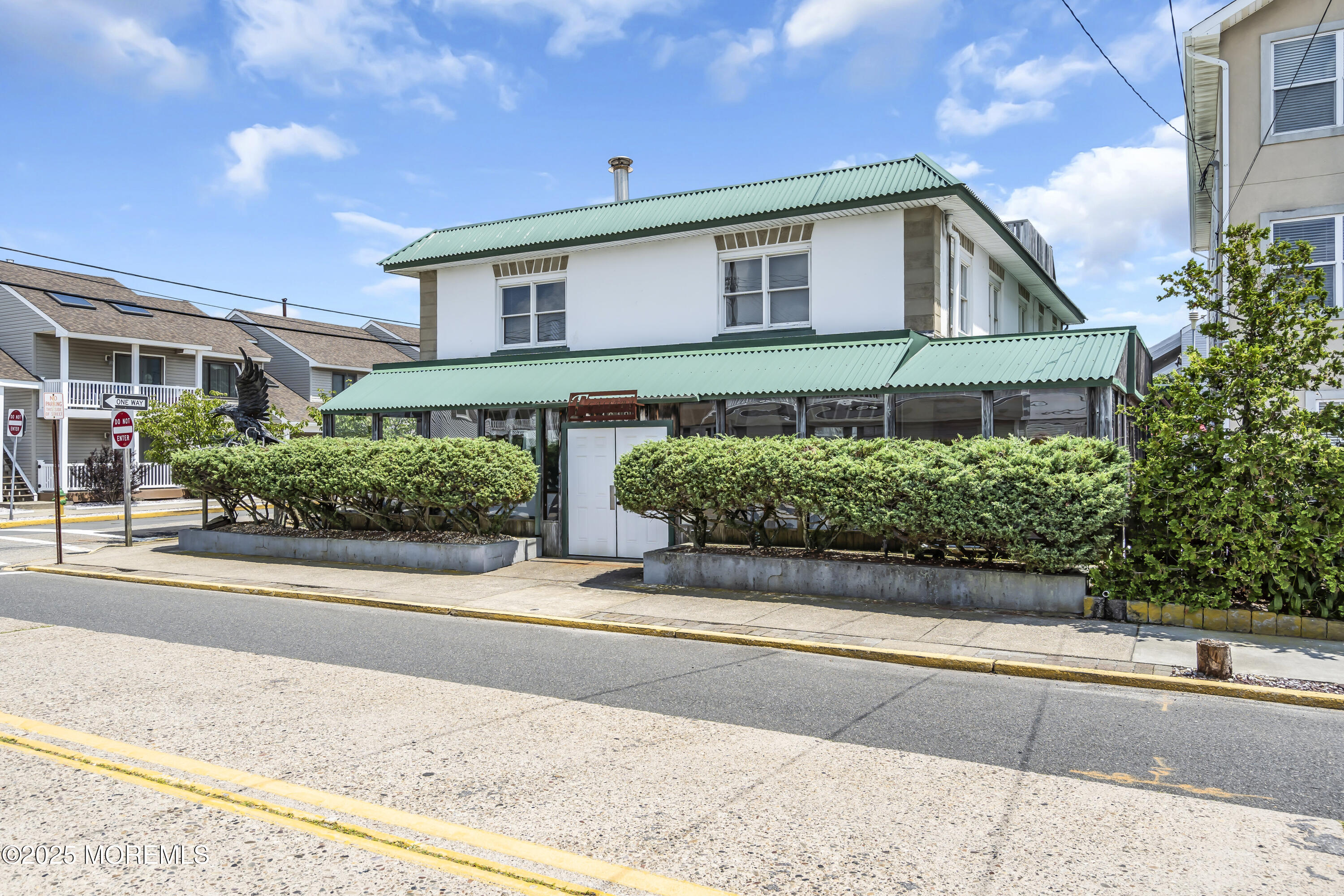 Boulevard, Unit 18 Seaside Park, NJ 08752 - Photo 2 of 60 front view of a house