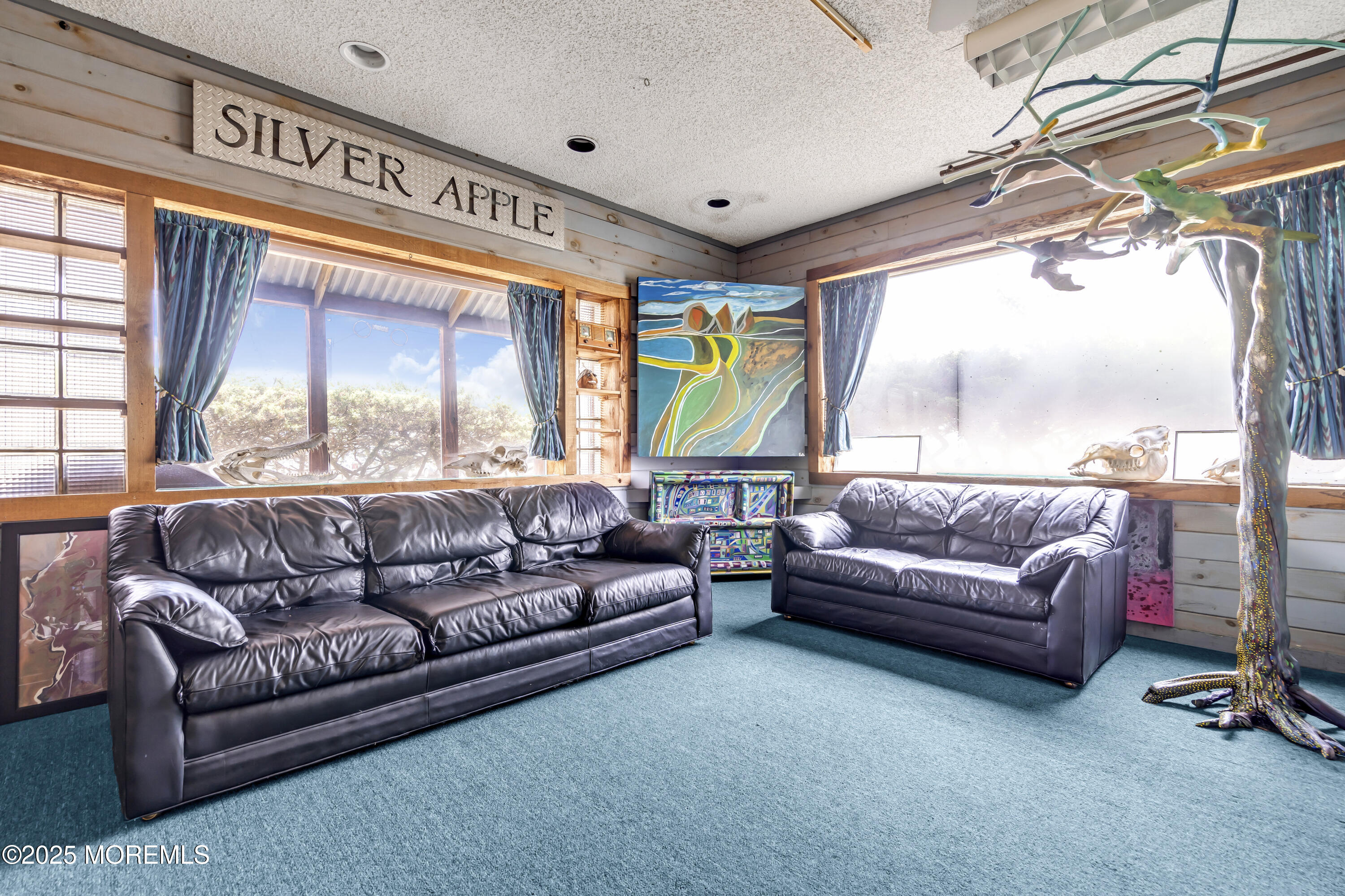 Boulevard, Unit 18 Seaside Park, NJ 08752 - Photo 26 of 60 a living room with furniture and a large window