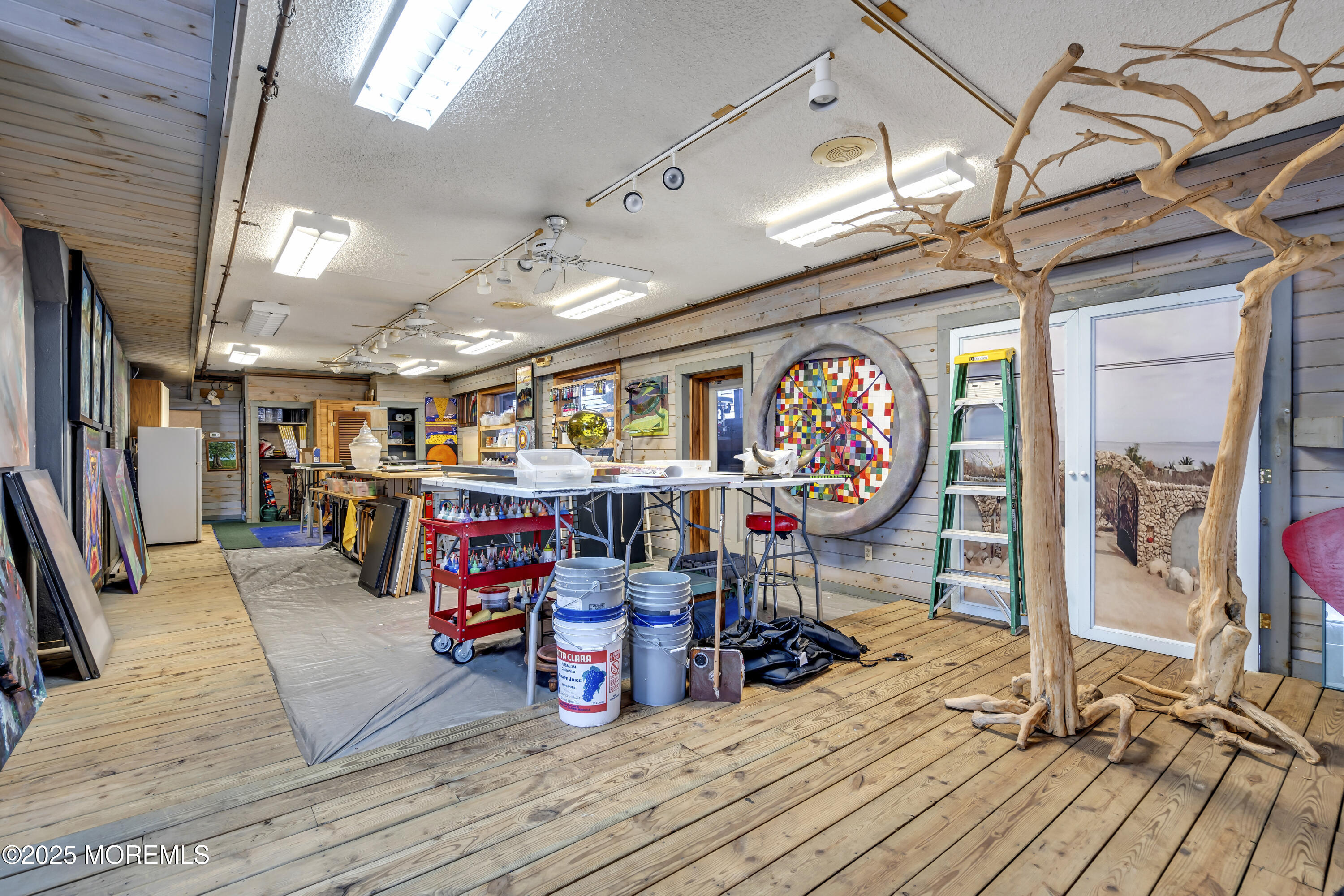 Boulevard, Unit 18 Seaside Park, NJ 08752 - Photo 28 of 60 a view of a room with lots of wooden furniture