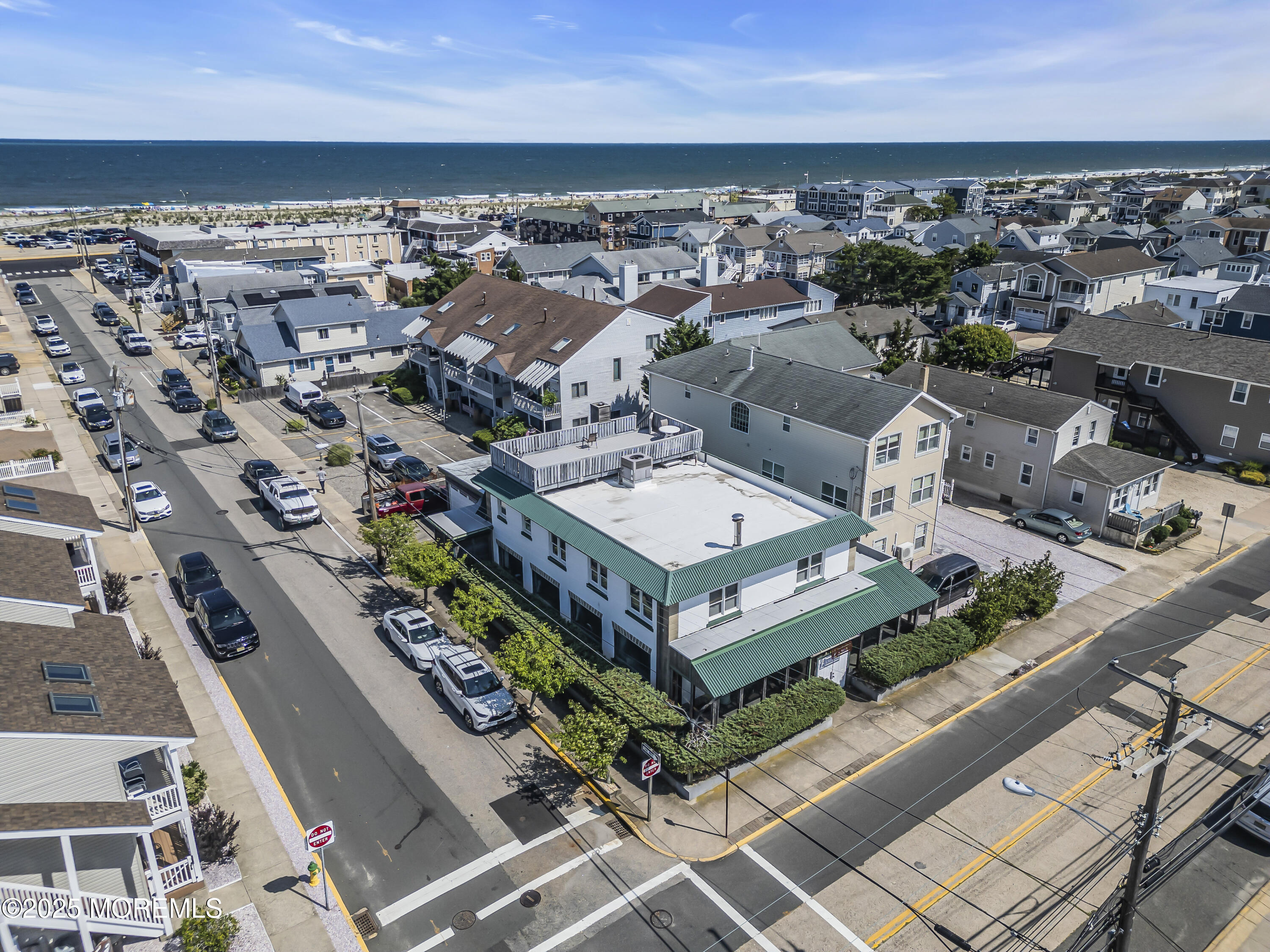 Boulevard, Unit 18 Seaside Park, NJ 08752 - Photo 32 of 60 an aerial view of a house with a garden