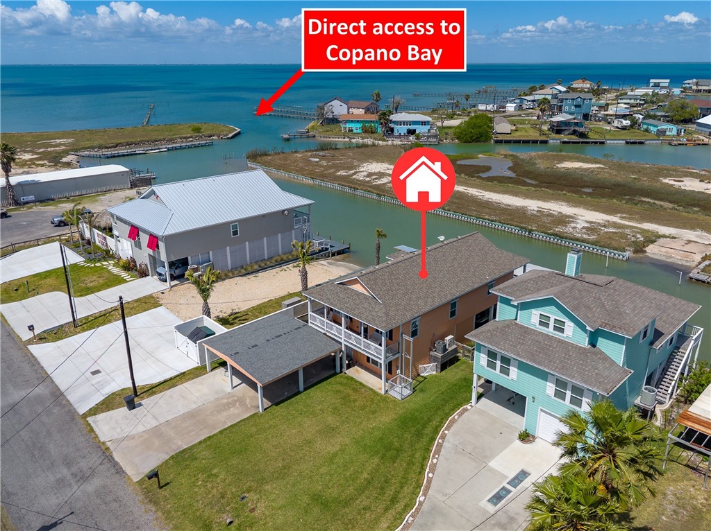 838 Rattlesnake Point Road Rockport, TX 78382 - Photo 39 of 40 an aerial view of a house with swimming pool patio and outdoor seating