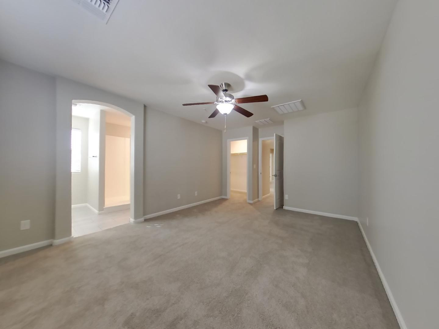 12565 West Via Dona Road Peoria, AZ 85383 - Photo 7 of 17 a view of a livingroom with a ceiling fan and window