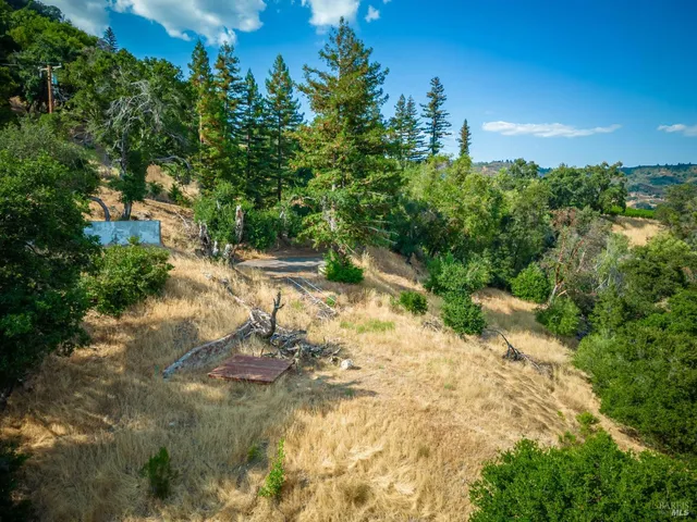a view of a road with a yard