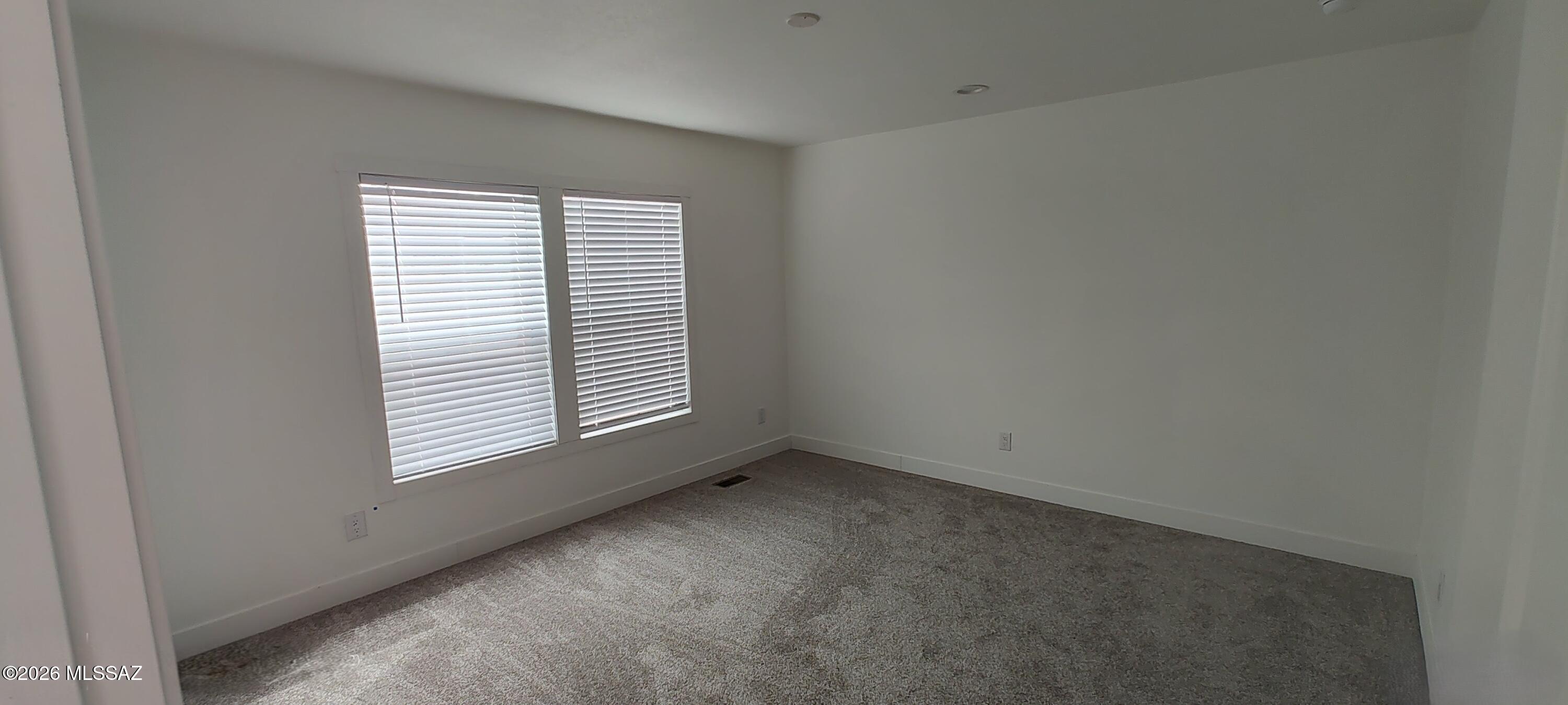 18565 West McClean Road Marana, AZ 85653 - Photo 14 of 37 an empty room with a window