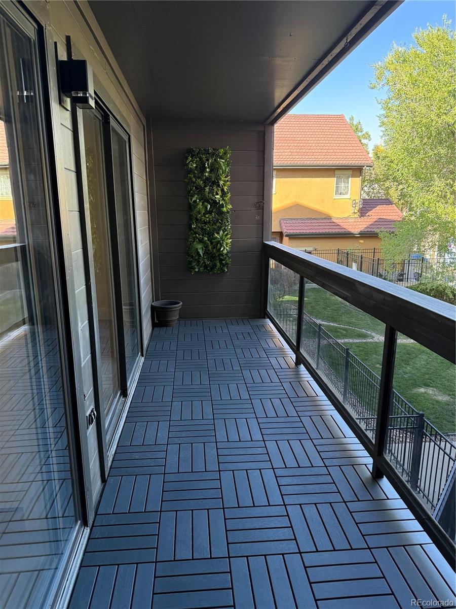 350 Detroit Street, Unit 209 Denver, CO 80206 - Photo 12 of 12 a view of balcony with wooden floor