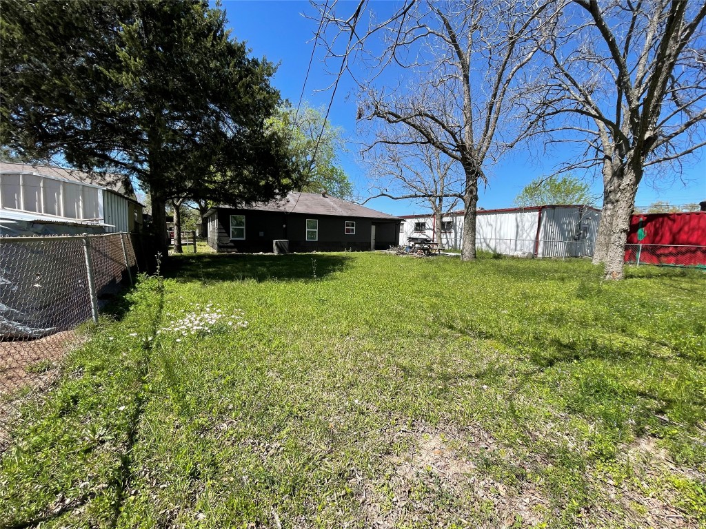 1119 Tobola Street Rosenberg, TX 77471 - Photo 12 of 14 a view of a house with a yard