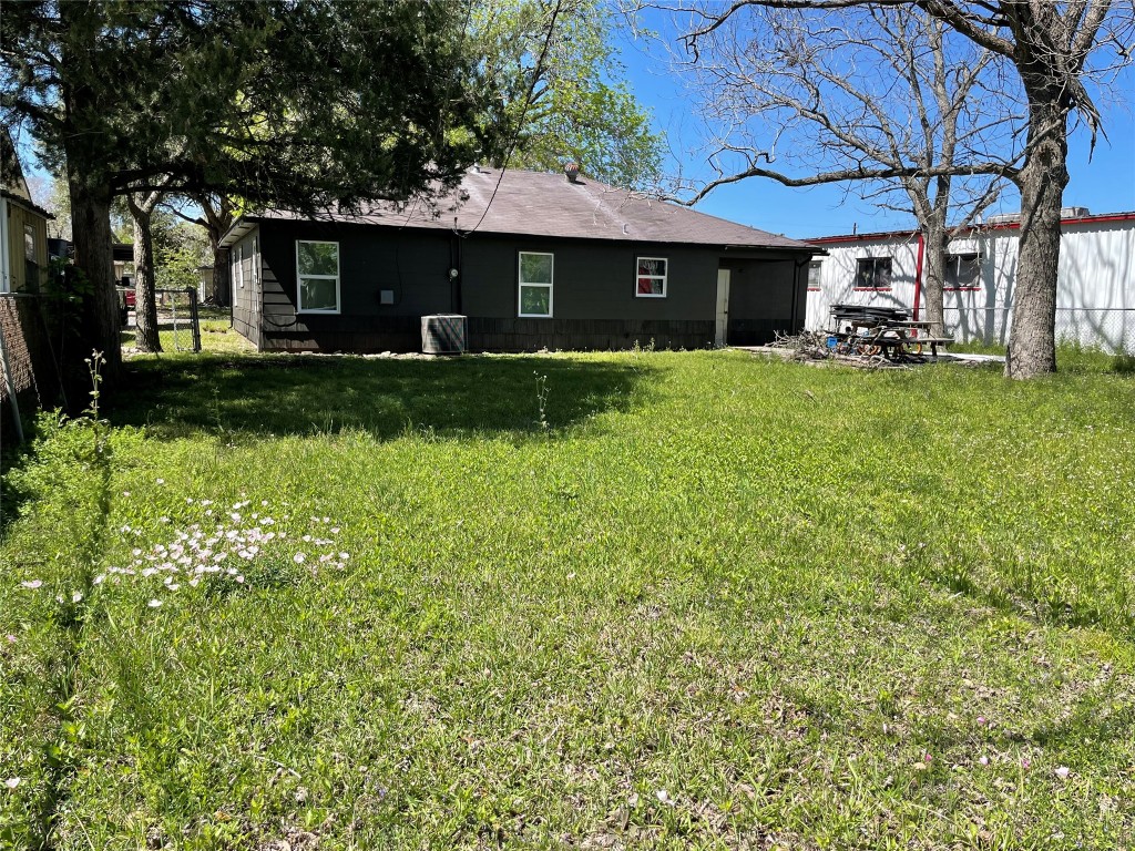 1119 Tobola Street Rosenberg, TX 77471 - Photo 13 of 14 a front view of a house with garden