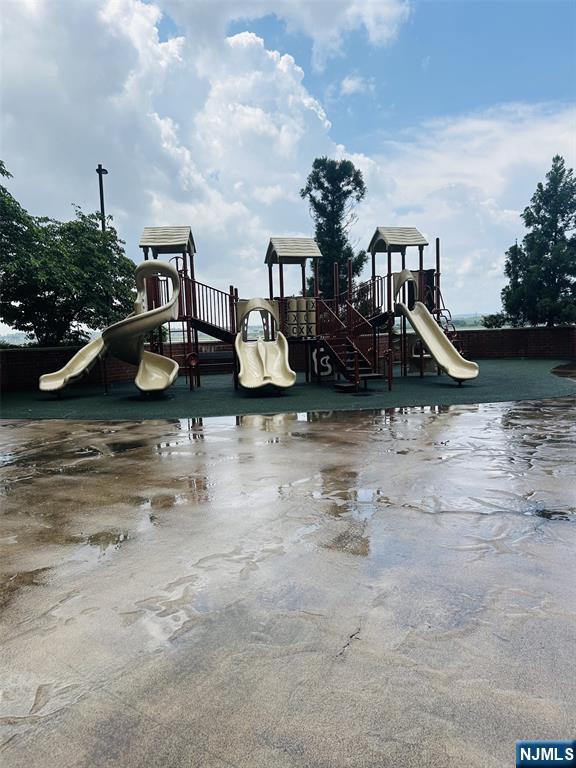 1040 Harmon Cove Tower, Unit 1040 Secaucus, NJ 07094 - Photo 15 of 15 a view of a lake with an outdoor space