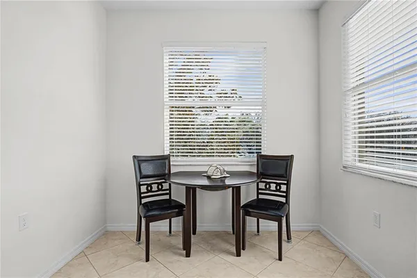 a view of a workspace with furniture