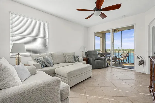 a living room with furniture and a window