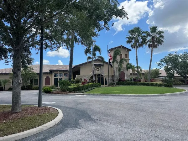 a view of a lake with a big yard
