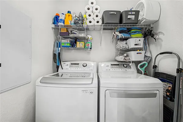 a utility room with dryer and washer