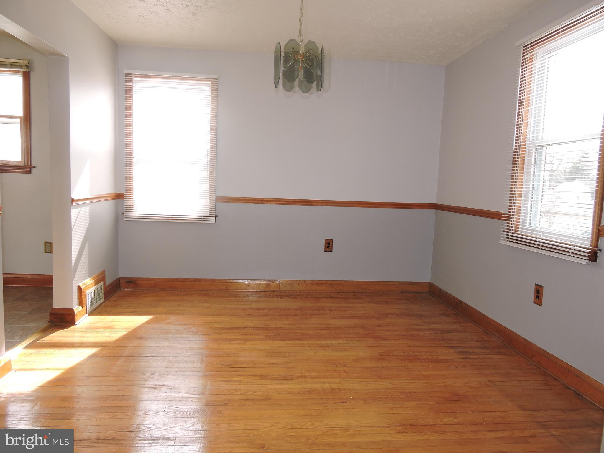 8705 School Road Baltimore, MD 21234 - Photo 8 of 56 Dining room w/ chair rail
