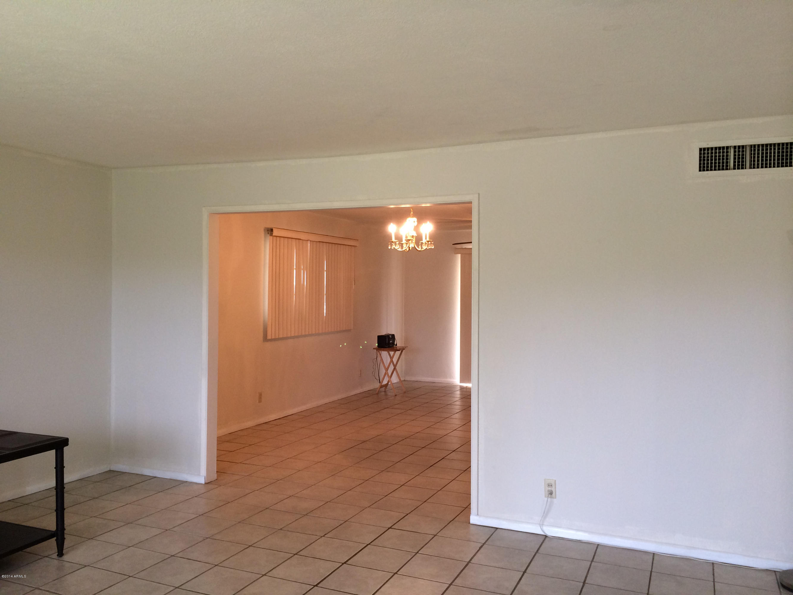 3537 West Ocotillo Road Phoenix, AZ 85019 - Photo 8 of 24 living room into dining area
