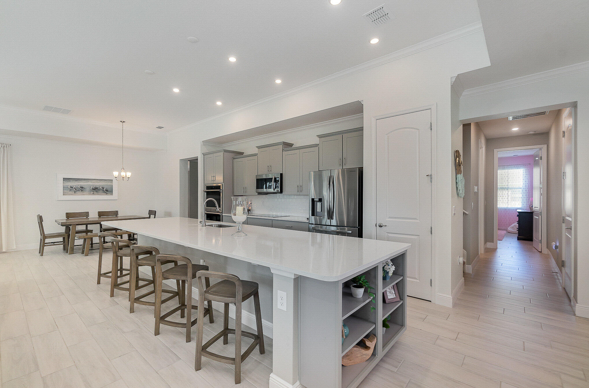 1780 Indria Lane Malabar, FL 32950 - Photo 11 of 35 a large kitchen with lots of counter space and chairs