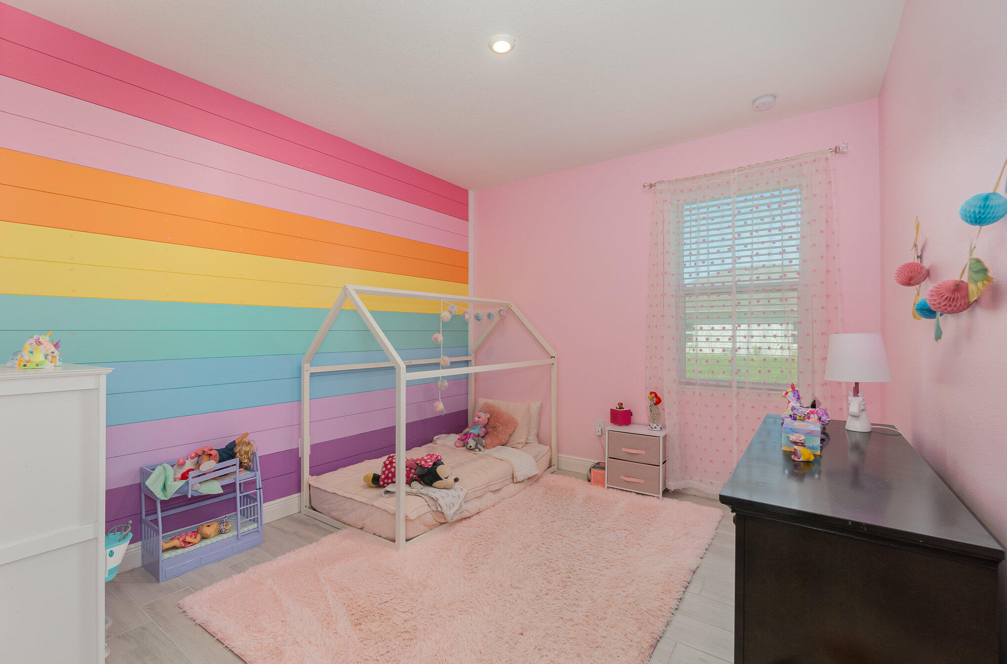 1780 Indria Lane Malabar, FL 32950 - Photo 22 of 35 a bedroom with a bed and a window