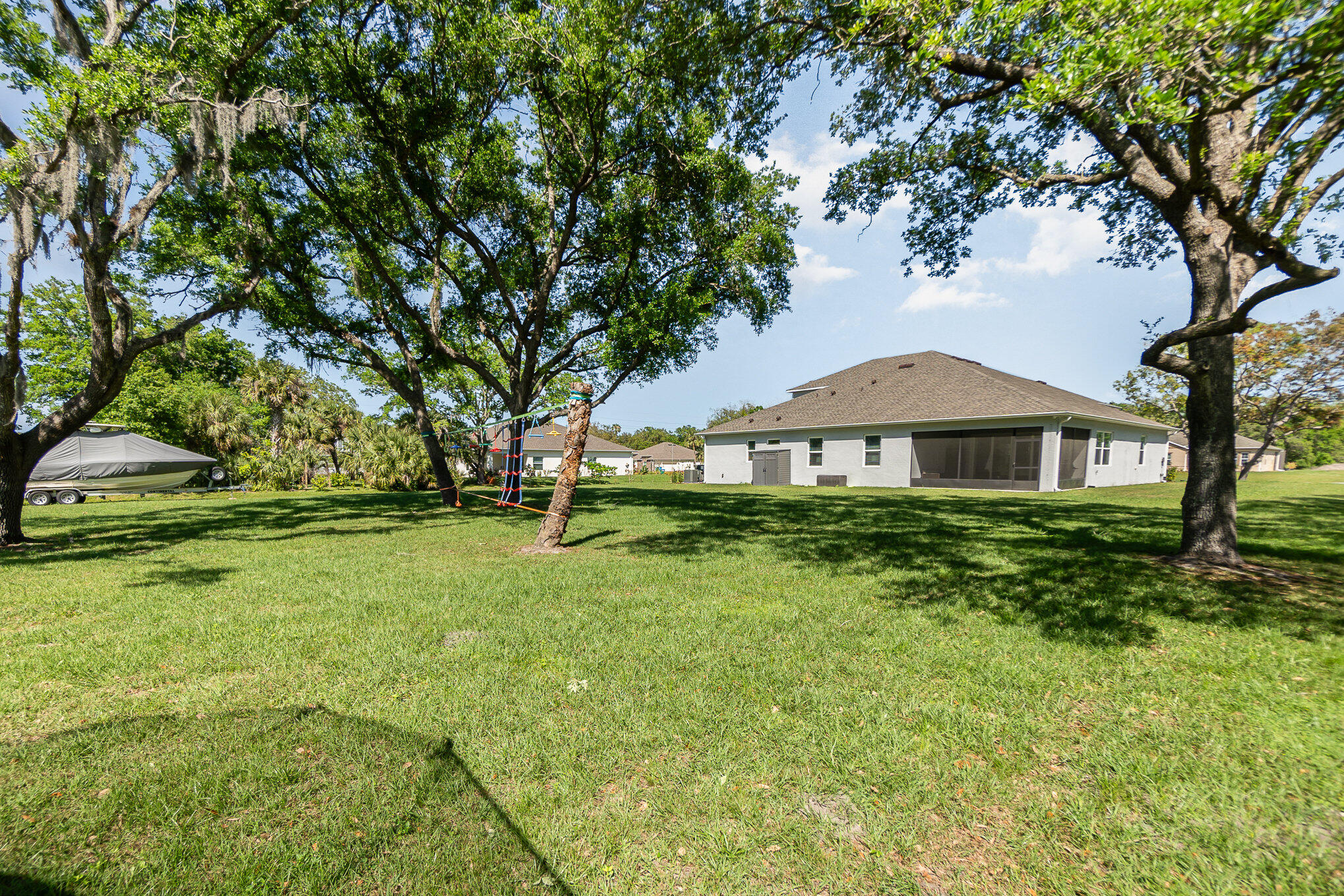 1780 Indria Lane Malabar, FL 32950 - Photo 31 of 35 a front view of a house with a yard
