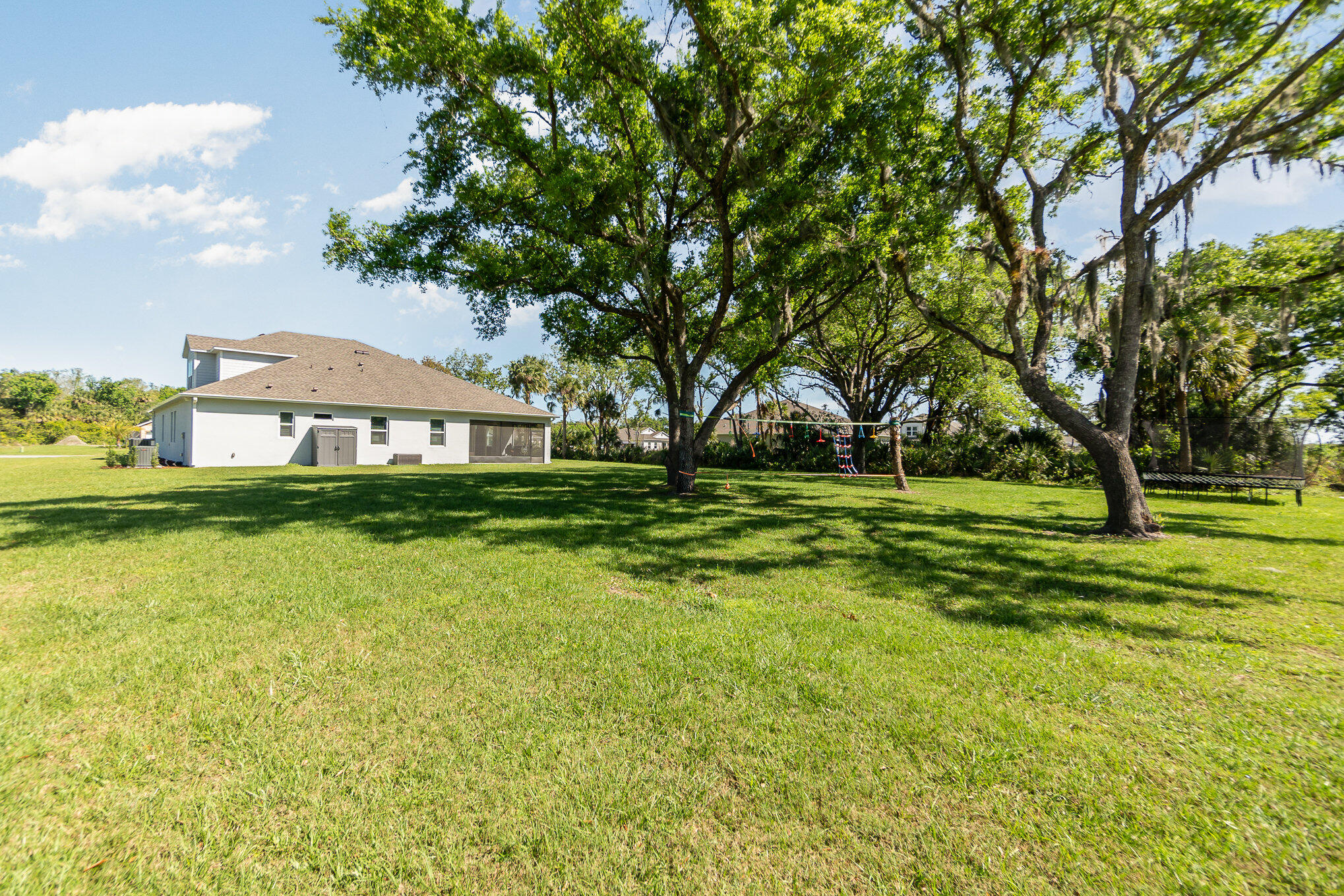1780 Indria Lane Malabar, FL 32950 - Photo 32 of 35 a front view of a house with a yard