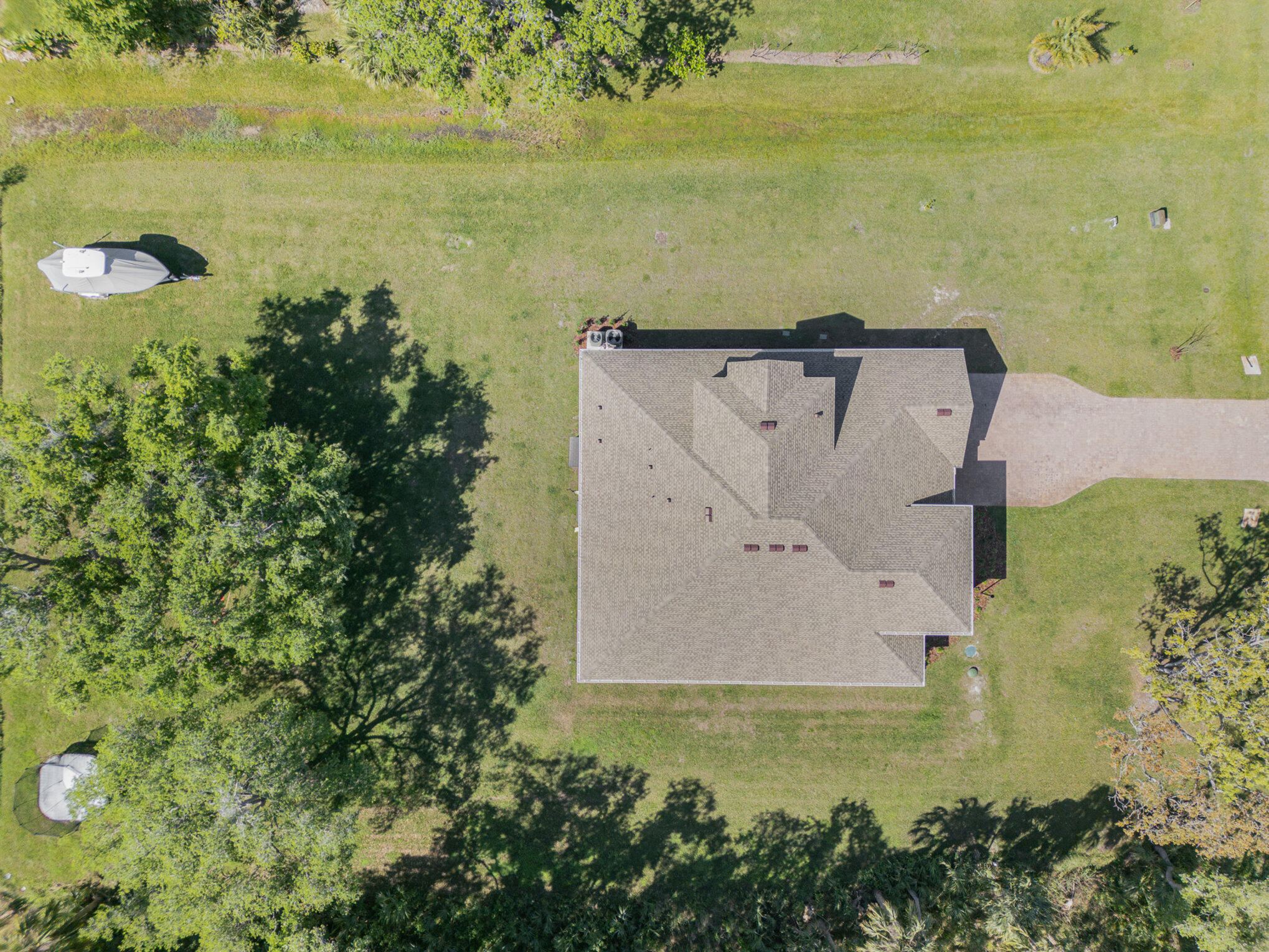 1780 Indria Lane Malabar, FL 32950 - Photo 33 of 35 an aerial view of beach with residential house and ocean view
