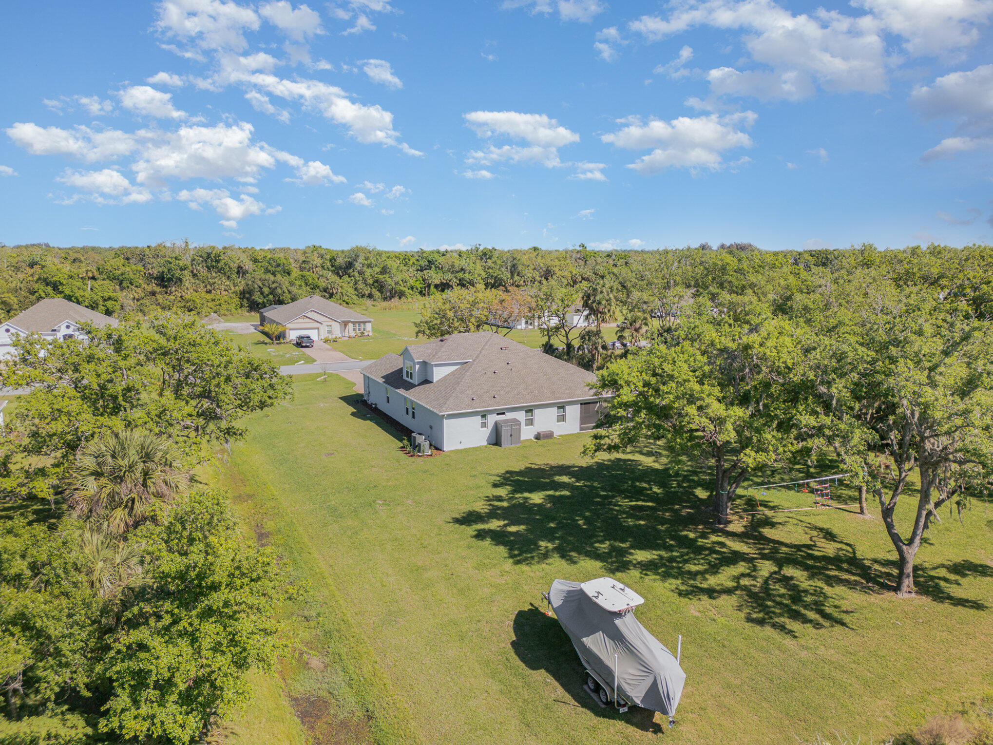 1780 Indria Lane Malabar, FL 32950 - Photo 34 of 35 a view of a yard with front of house