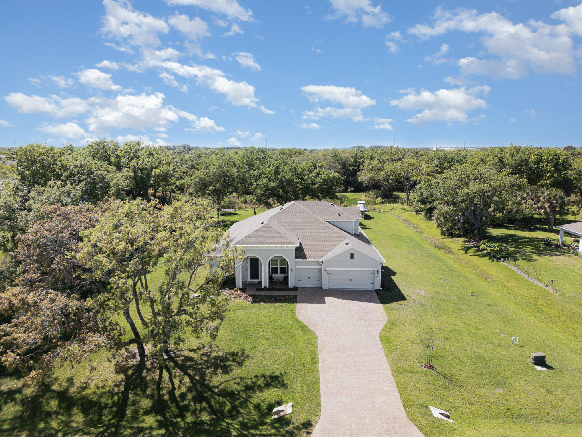 1780 Indria Lane Malabar, FL 32950 - Photo 4 of 35 a aerial view of a house with a yard
