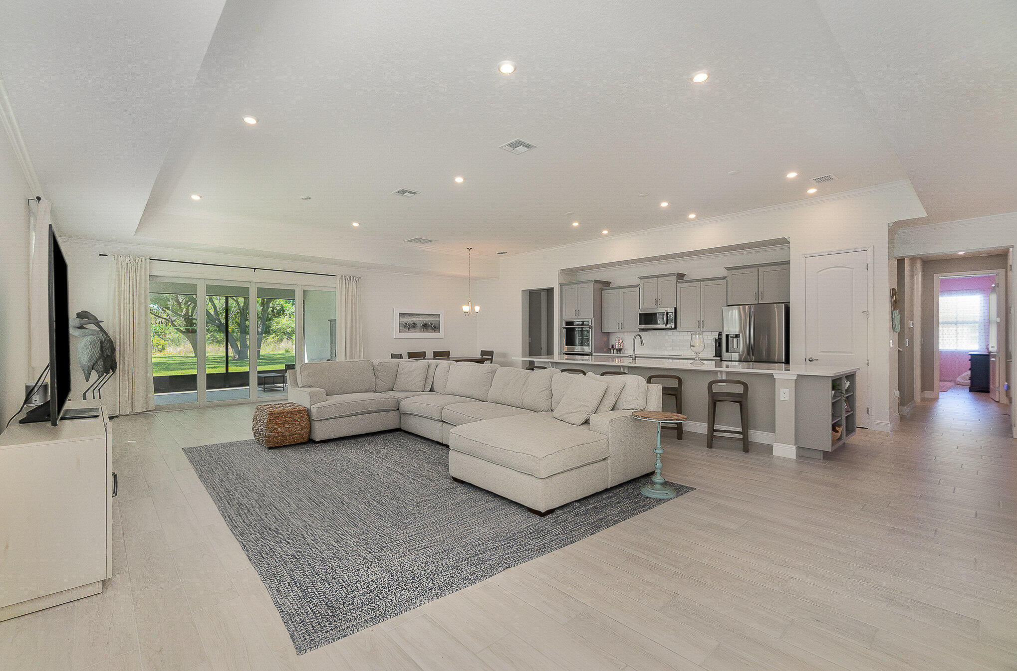 1780 Indria Lane Malabar, FL 32950 - Photo 6 of 35 a living room with furniture and a large window