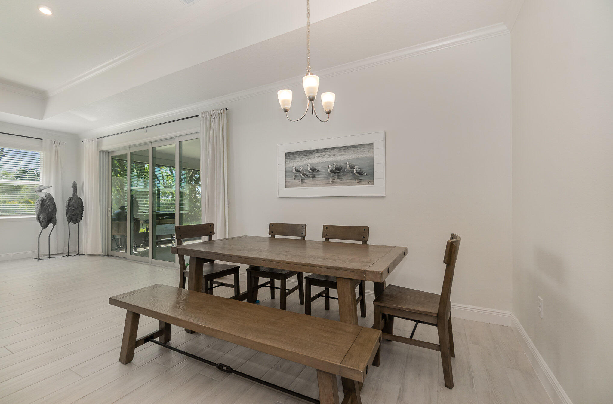 1780 Indria Lane Malabar, FL 32950 - Photo 7 of 35 a view of a dining room with furniture window and outside view