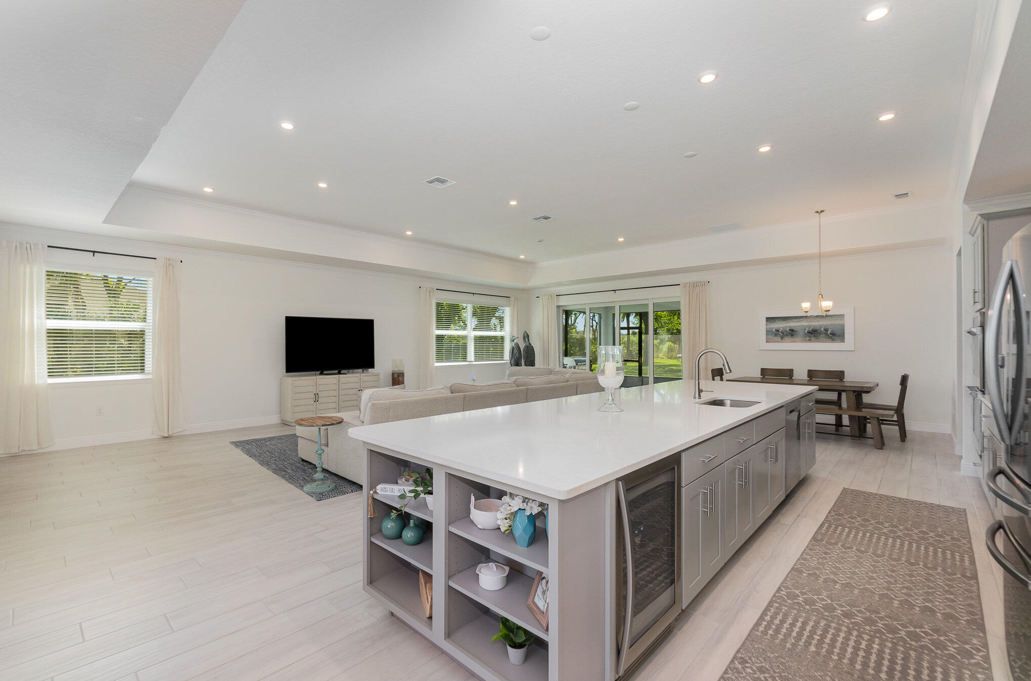 1780 Indria Lane Malabar, FL 32950 - Photo 9 of 35 a large kitchen with a table and chairs
