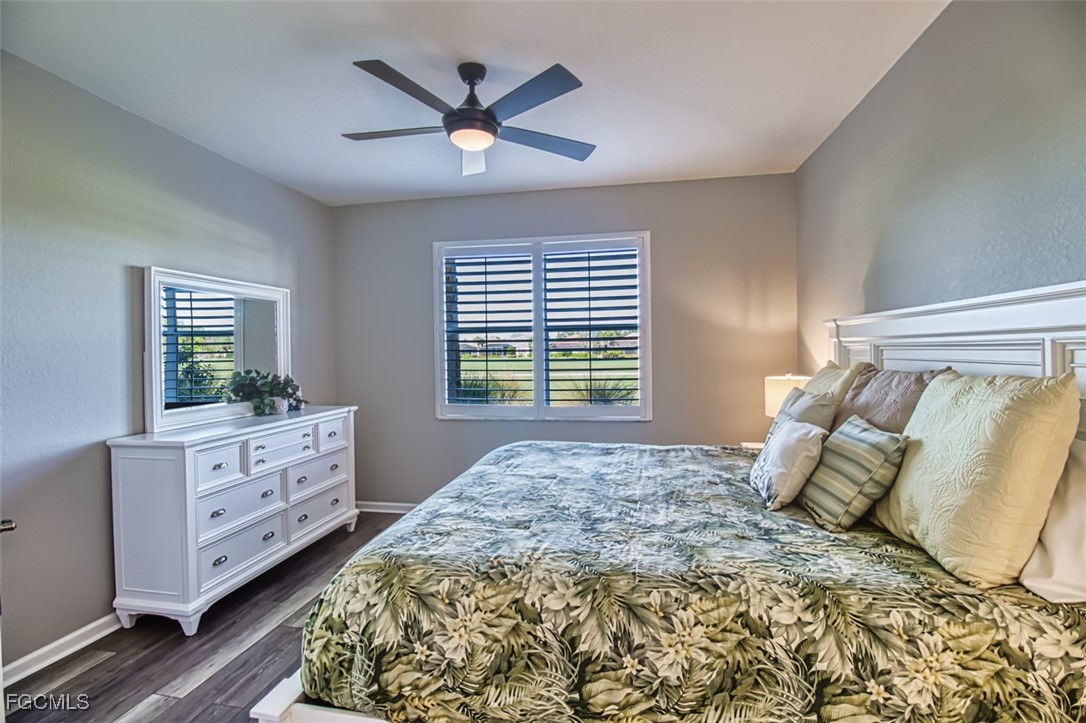 3111 Meandering Way, Unit 101 Fort Myers, FL 33905 - Photo 27 of 50 a bedroom with a bed and a window