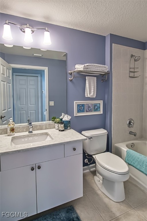 3111 Meandering Way, Unit 101 Fort Myers, FL 33905 - Photo 32 of 50 a bathroom with a toilet a sink and mirror