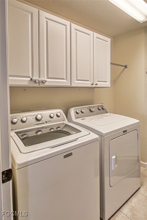 3111 Meandering Way, Unit 101 Fort Myers, FL 33905 - Photo 33 of 50 a utility room with dryer and washer