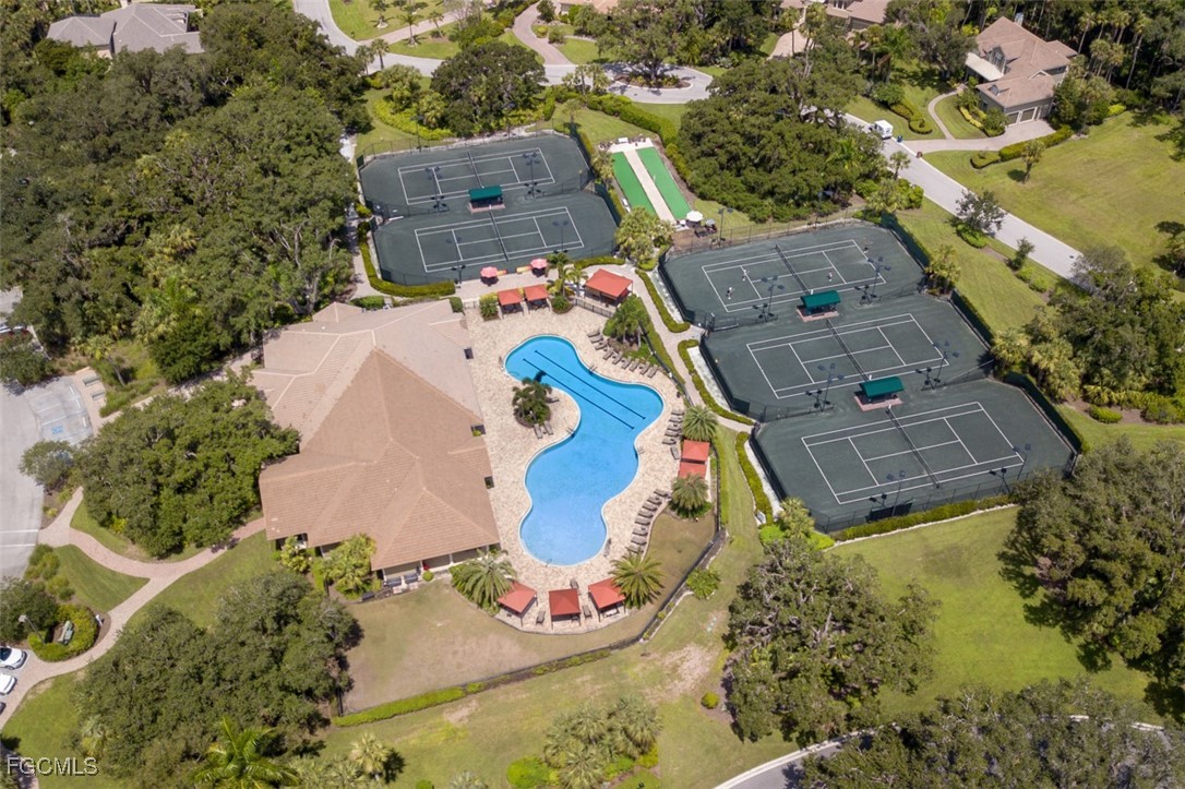 3111 Meandering Way, Unit 101 Fort Myers, FL 33905 - Photo 46 of 50 an aerial view of residential houses with outdoor space