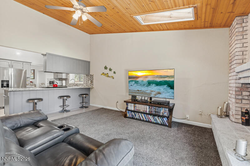 675 College Drive Reno, NV 89503 - Photo 14 of 30 a living room with furniture and a flat screen tv