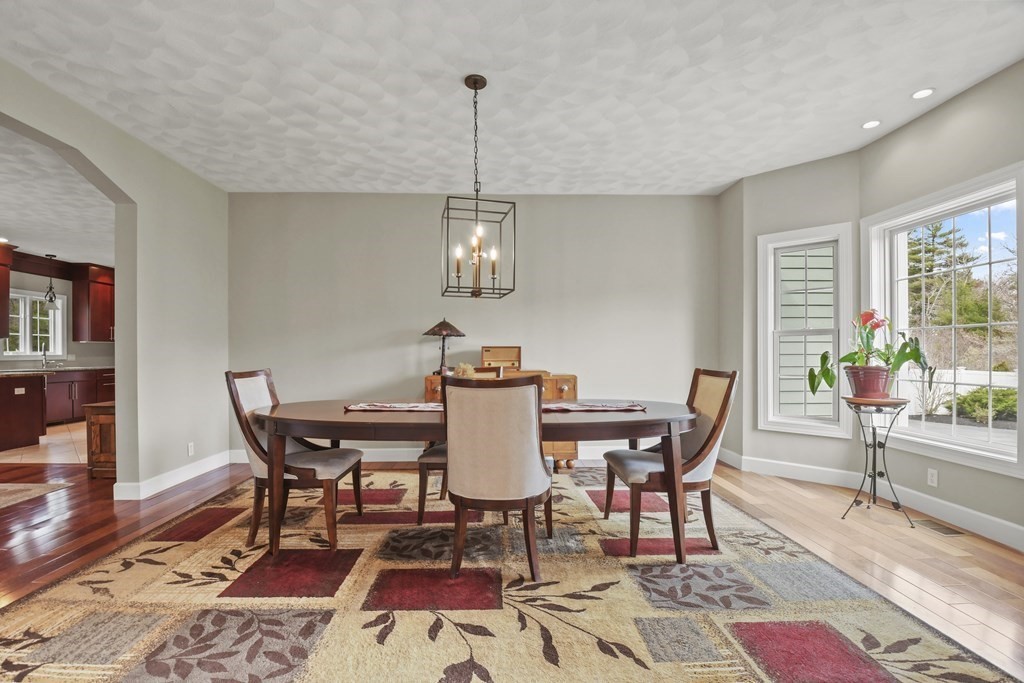 25 Wilkes Road Rowley, MA 01969 - Photo 5 of 40 a view of a dining room with furniture window and wooden floor