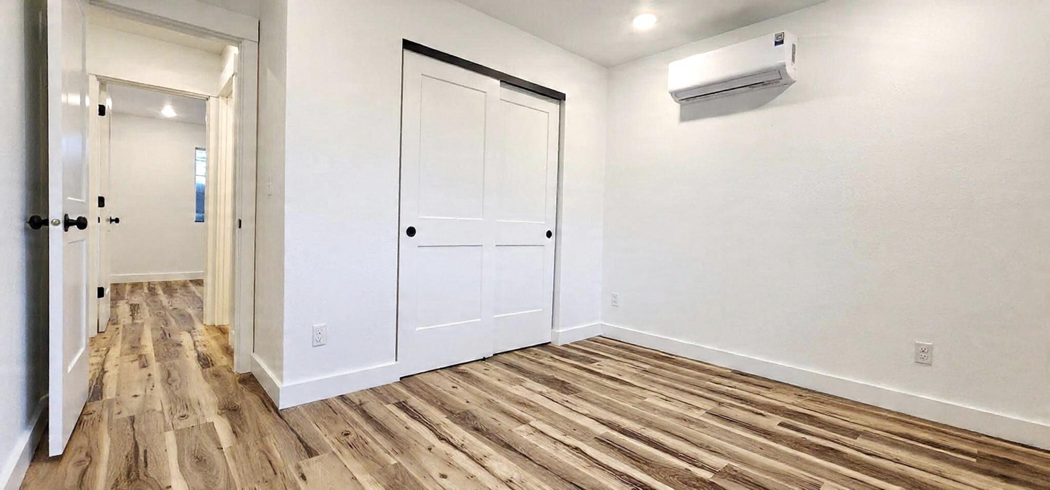 116 Bill Storie Road Byrdstown, TN 38549 - Photo 23 of 30 a view of a hallway with wooden floor and staircase
