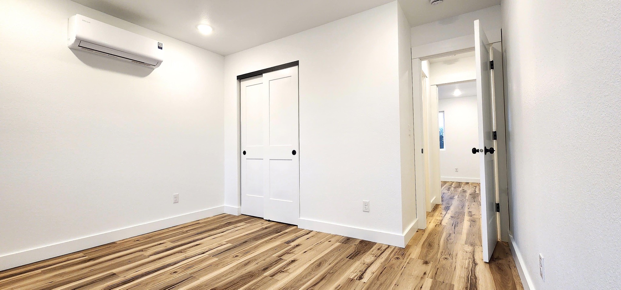 116 Bill Storie Road Byrdstown, TN 38549 - Photo 27 of 30 a view of a room with wooden floor and a bathroom