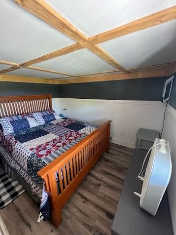 766 Monroe Floyd Road Decherd, TN 37324 - Photo 6 of 8 a bed sitting in a bedroom next to a larger window
