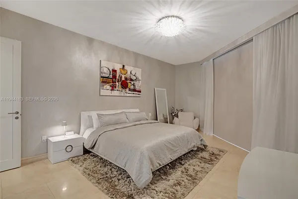 a view of balcony with chair and potted plants