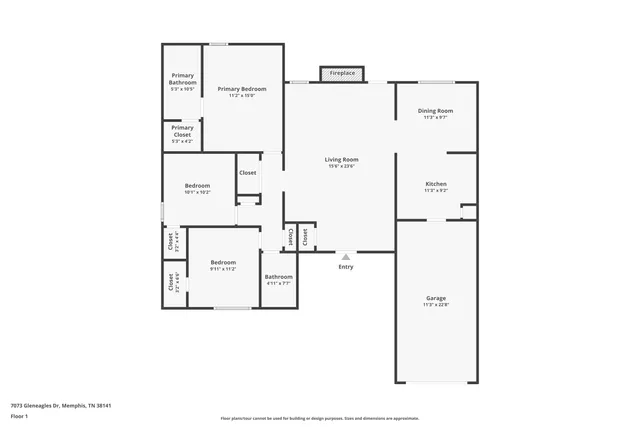 a front view of a house with a garden and yard