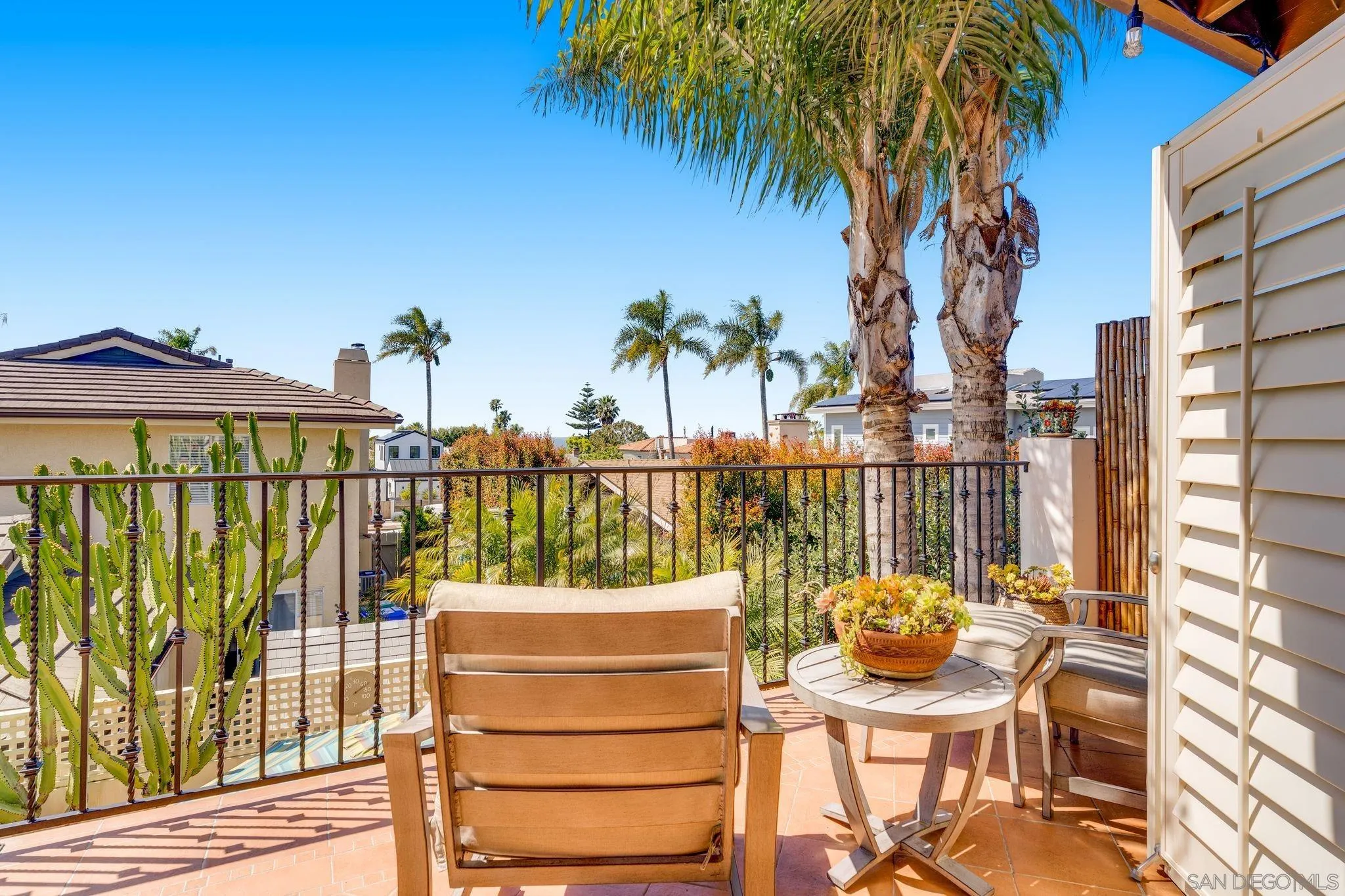 818 Genter Street La Jolla, CA 92037 - Photo 19 of 26 a view of a chairs and table on the patio