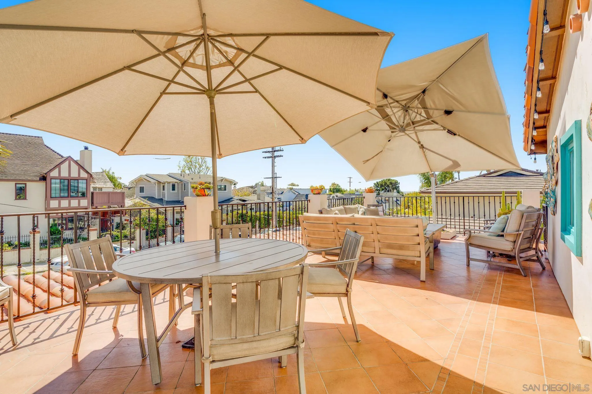 818 Genter Street La Jolla, CA 92037 - Photo 24 of 26 an outdoor space with furniture and umbrella