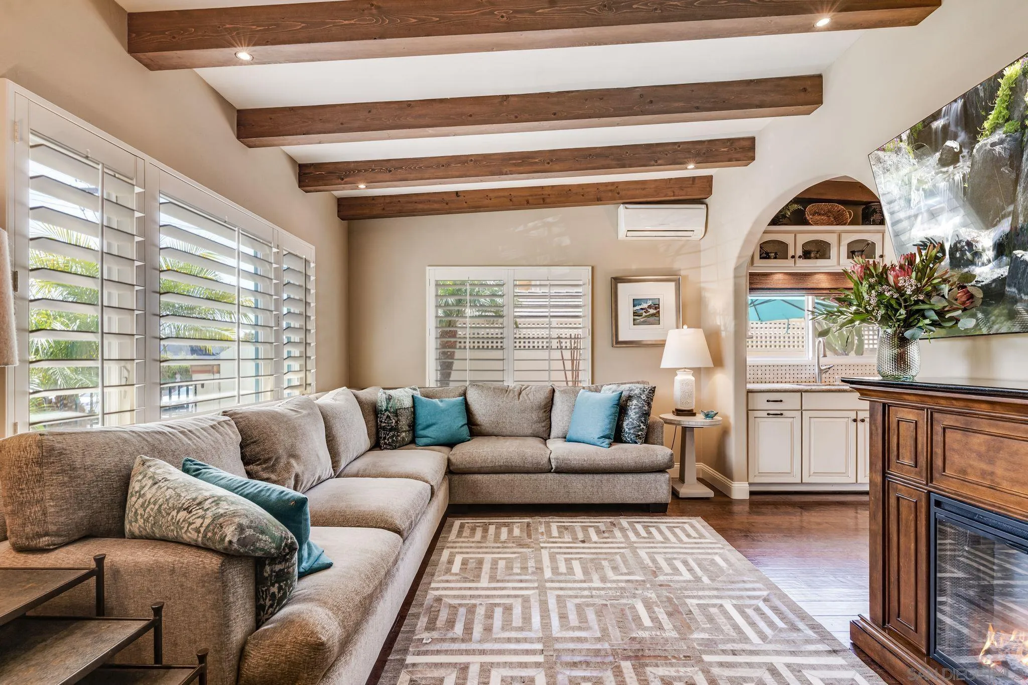818 Genter Street La Jolla, CA 92037 - Photo 3 of 26 a living room with furniture and a large window