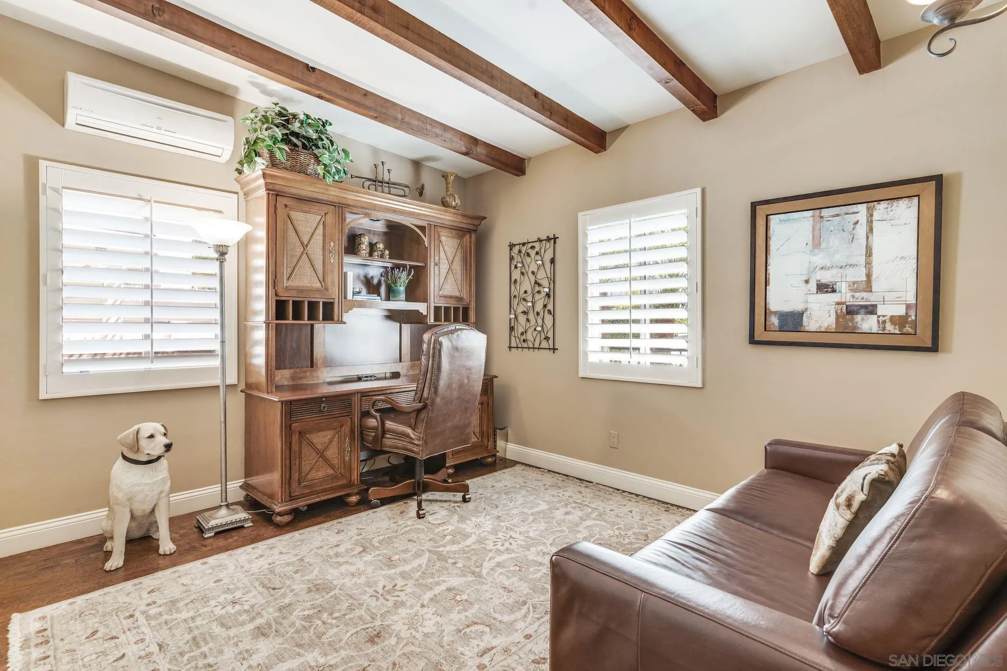 818 Genter Street La Jolla, CA 92037 - Photo 9 of 26 a view of a livingroom with workspace and a window