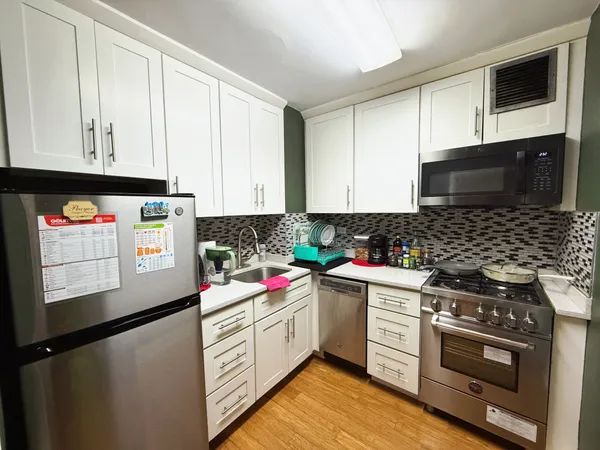 a picture of a room with a floor to ceiling window