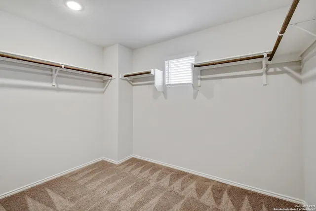 a view of a room with racks on the wall