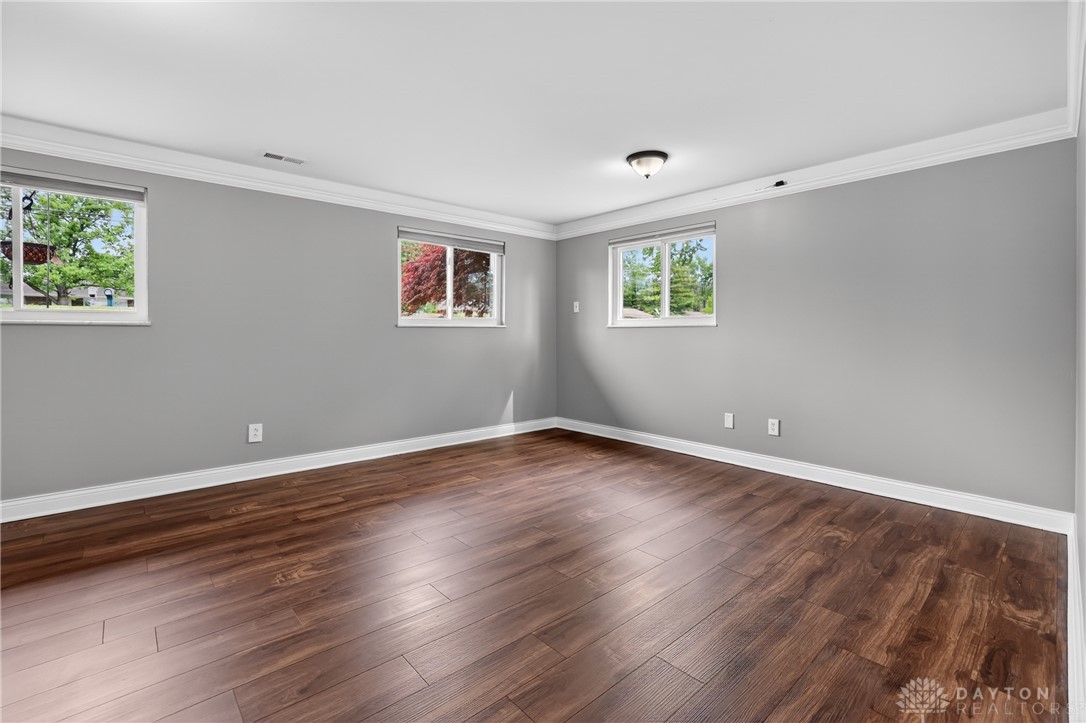 5741 Gray Road Fairfield, OH 45014 - Photo 13 of 32 This versatile room features warm flooring and ample natural light, creating a bright and inviting atmosphere.