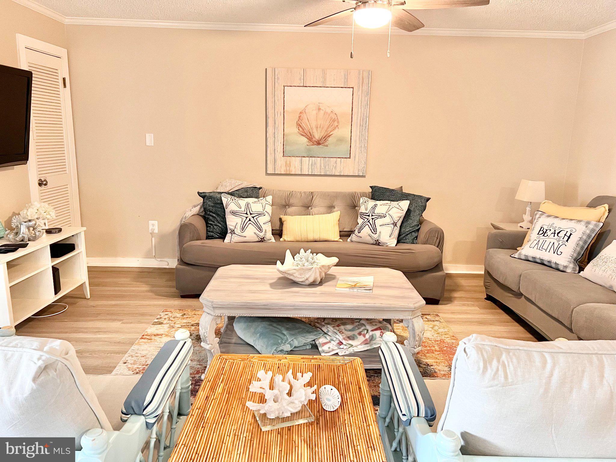 119 Old Landing Road, Unit 102F5 Ocean City, MD 21842 - Photo 12 of 19 Coastal charm in a cozy living space.