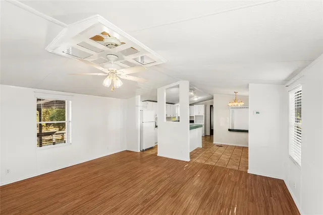 a view of a livingroom with wooden floor
