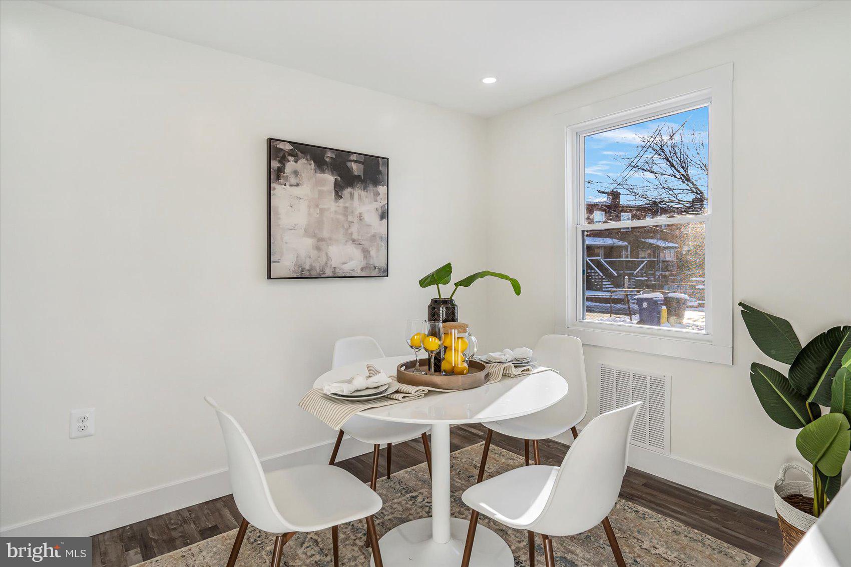 3925 Chesterfield Avenue Baltimore, MD 21213 - Photo 12 of 35 a dining room with furniture and window